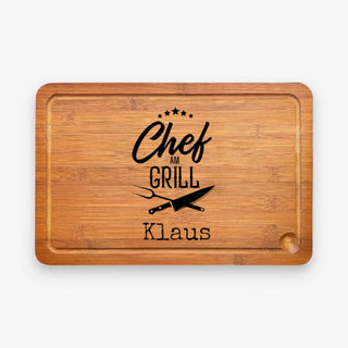 Schneidebrett aus dunklem Bambus Motiv Chef am Grill